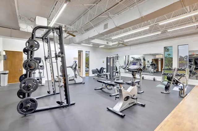 a view of a livingroom with couch and a window