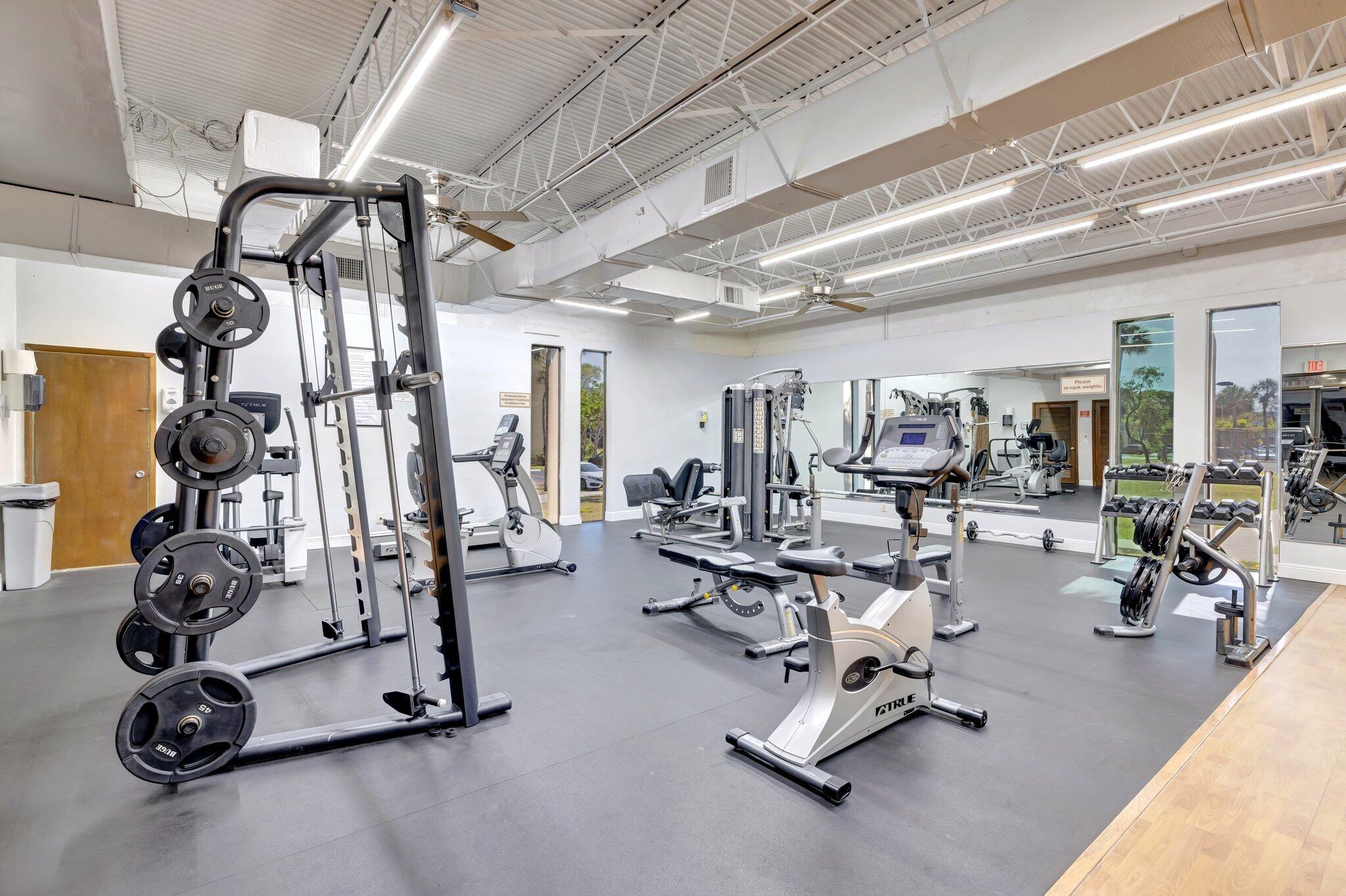 3301 Northwest 47th Terrace, Unit 410 Lauderdale Lakes, FL 33319 - Photo 35 of 58 a view of a room with gym equipment
