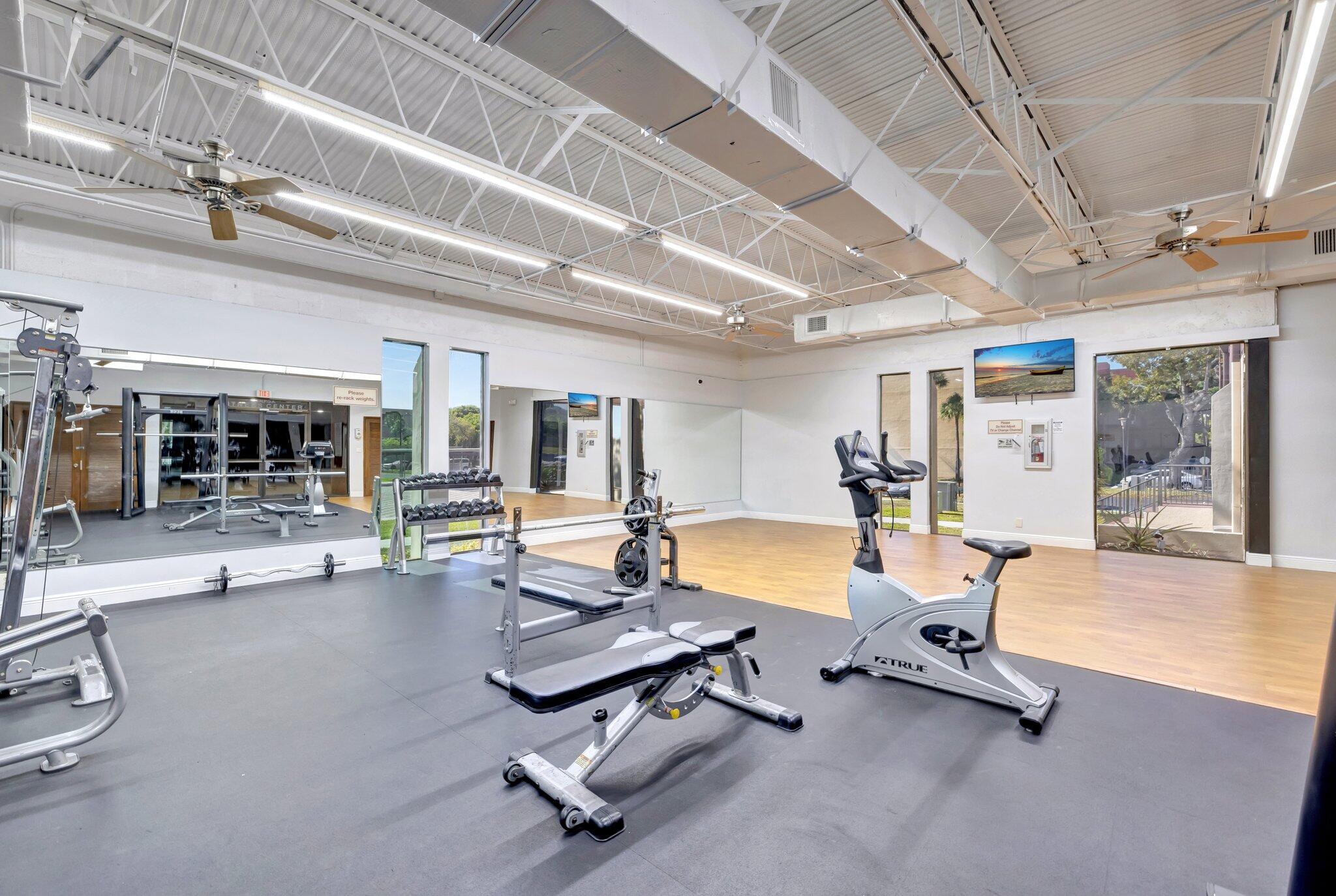 3301 Northwest 47th Terrace, Unit 410 Lauderdale Lakes, FL 33319 - Photo 37 of 58 a view of a room with gym equipment