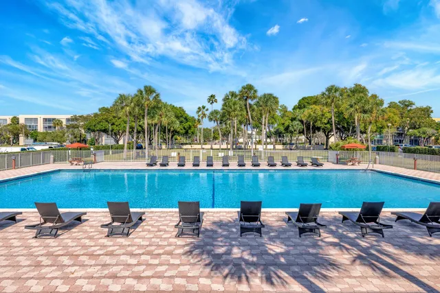 a view of a swimming pool with a patio