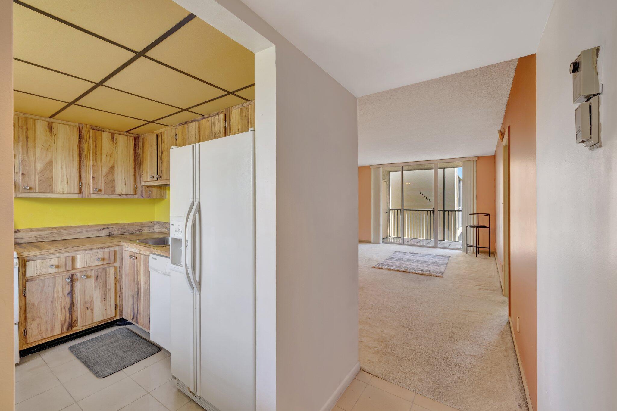 3301 Northwest 47th Terrace, Unit 410 Lauderdale Lakes, FL 33319 - Photo 4 of 58 a bathroom with a granite countertop sink and shower