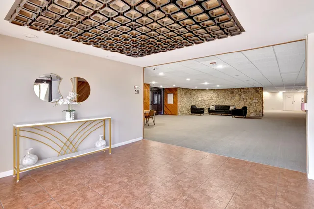 a view of a terrace with sitting area