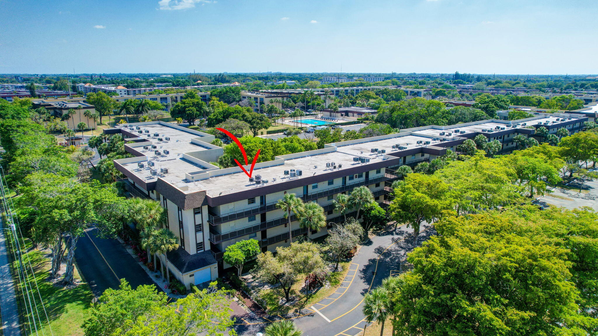3301 Northwest 47th Terrace, Unit 410 Lauderdale Lakes, FL 33319 - Photo 5 of 58 an aerial view of a house with a garden