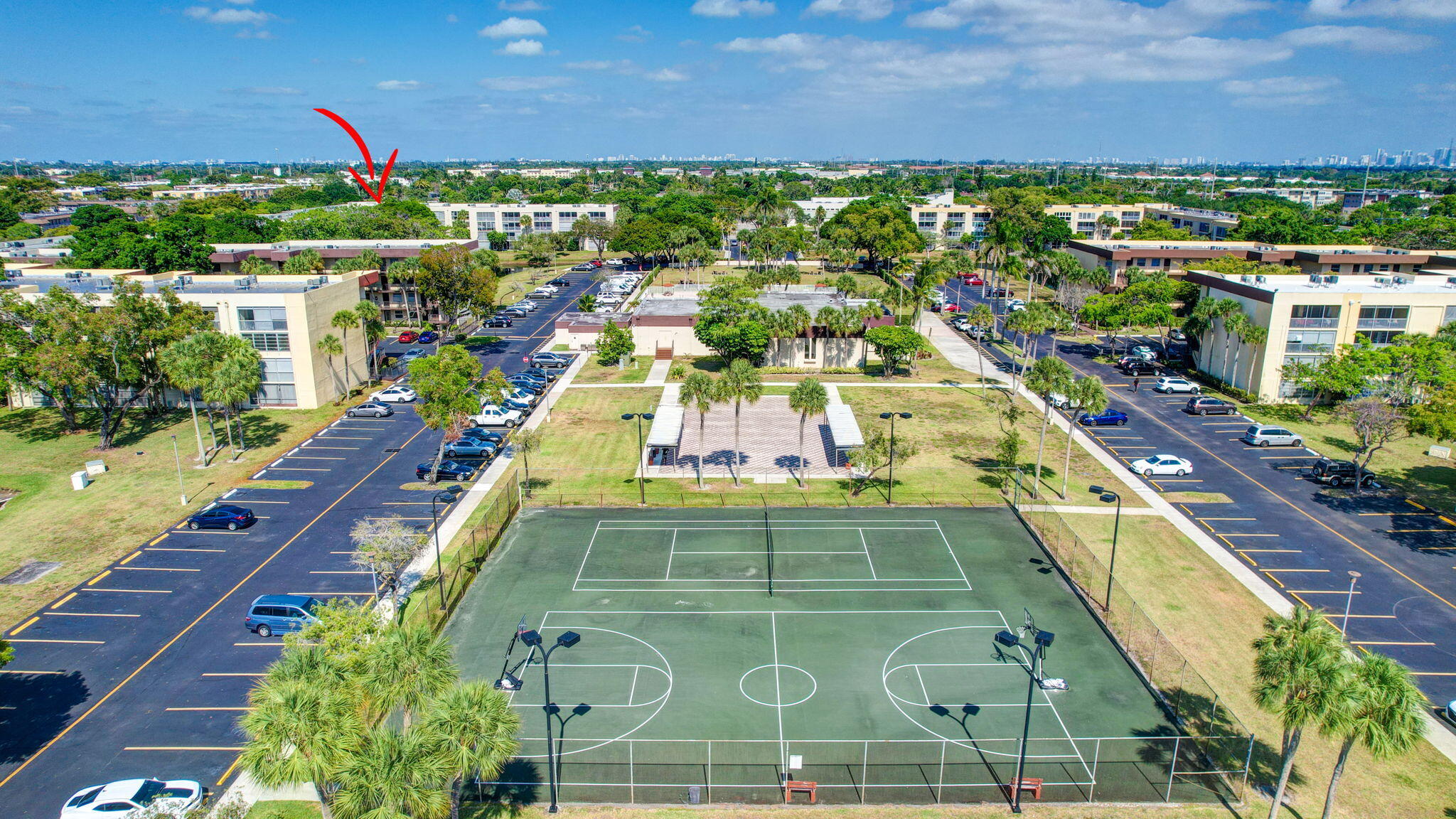 3301 Northwest 47th Terrace, Unit 410 Lauderdale Lakes, FL 33319 - Photo 56 of 58 a view of a tennis court