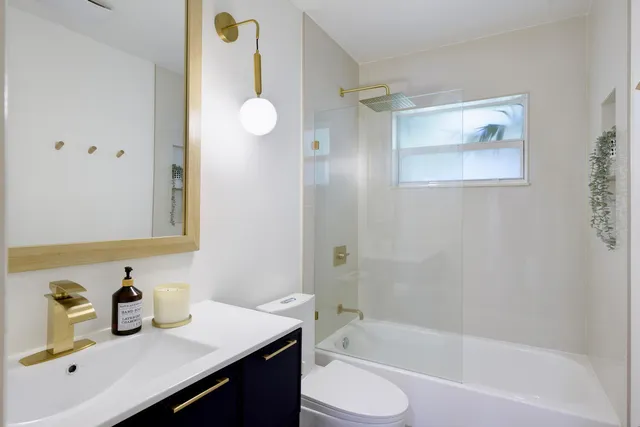 a bedroom with a bed furniture and a window