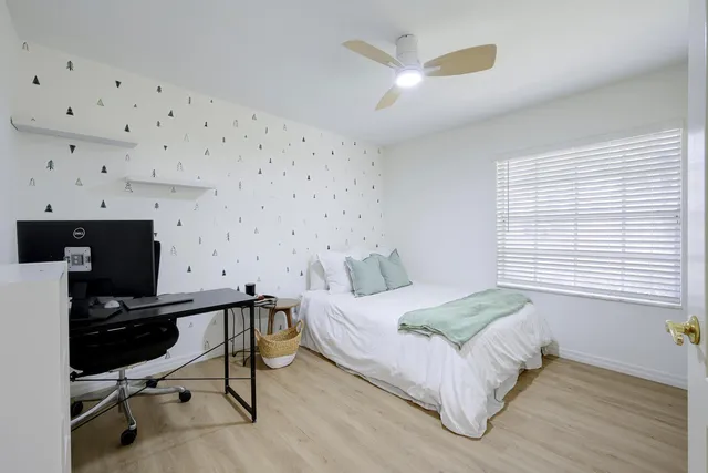 a view of a backyard with sitting area and furniture