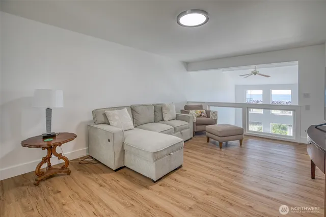 a bedroom with a bed and a lamp