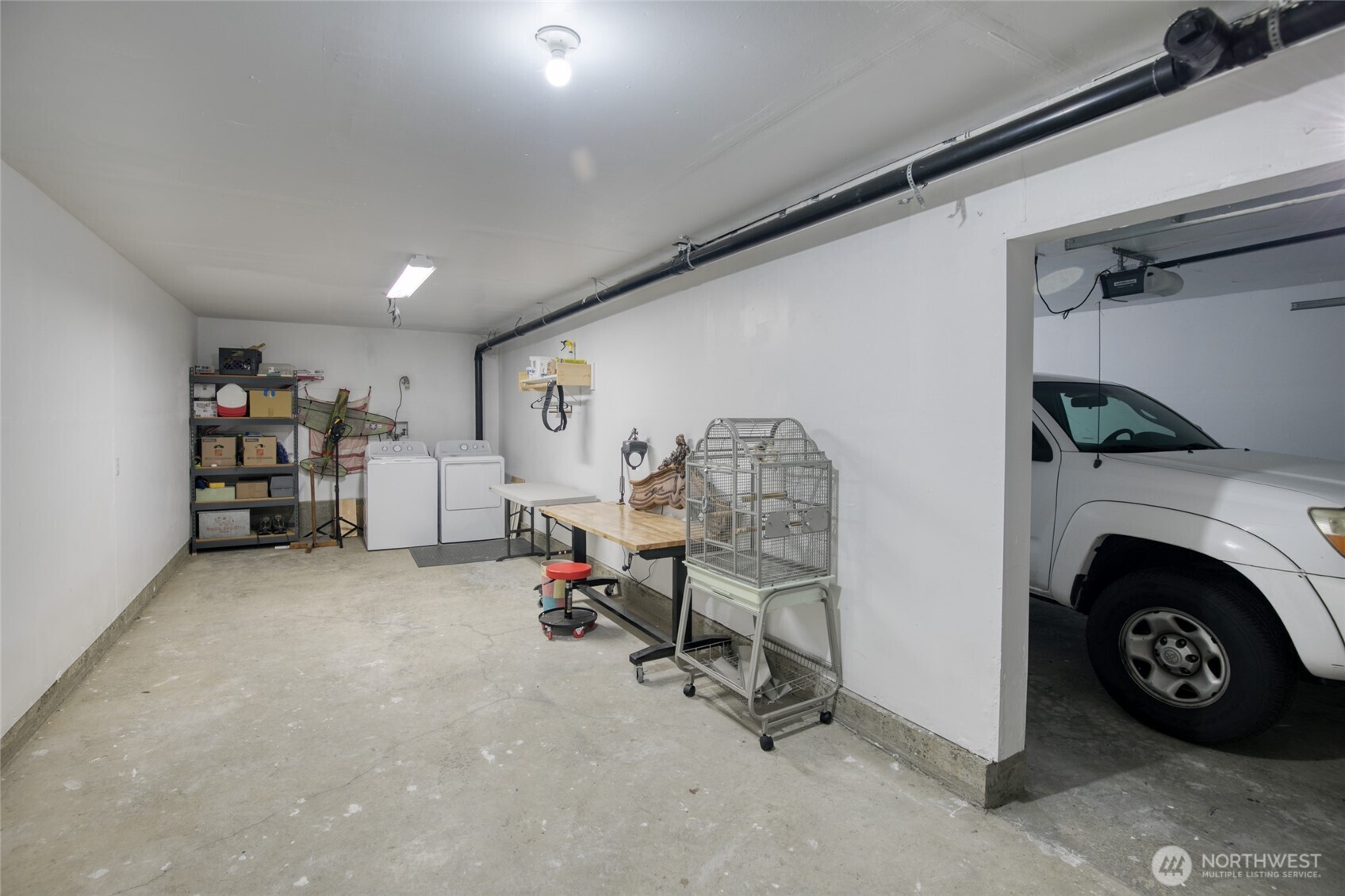1472 Storm King Way Southwest, Unit A Ocean Shores, WA 98569 - Photo 35 of 39 a view of livingroom with furniture and a fireplace