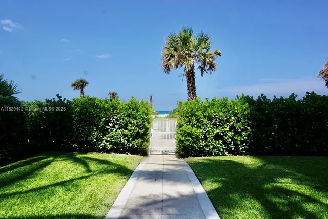 a view of a yard with a patio