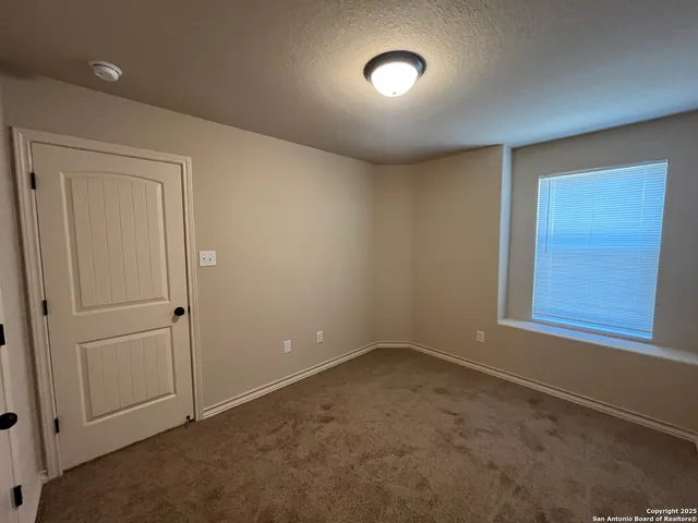a bathroom with a shower and a bathtub