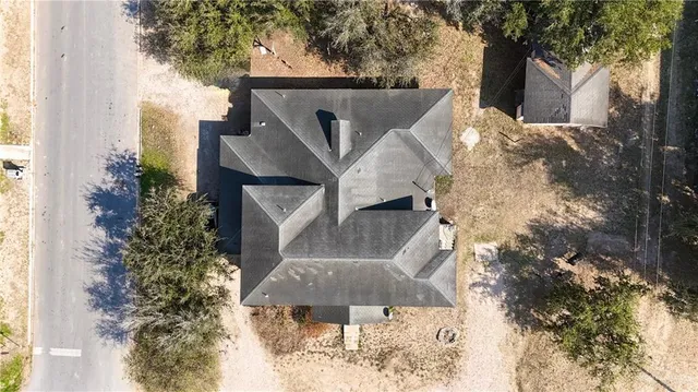 a view of a back yard of the house