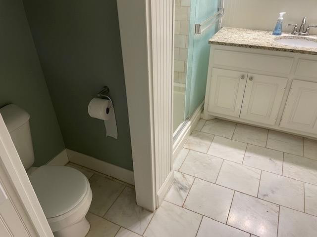 3018 32nd Street Lubbock, TX 79410 - Photo 25 of 33 a bathroom with a sink and toilet
