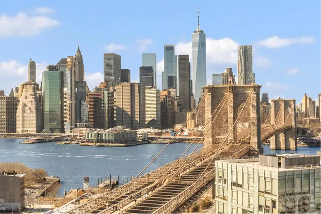 a view of a city with tall buildings