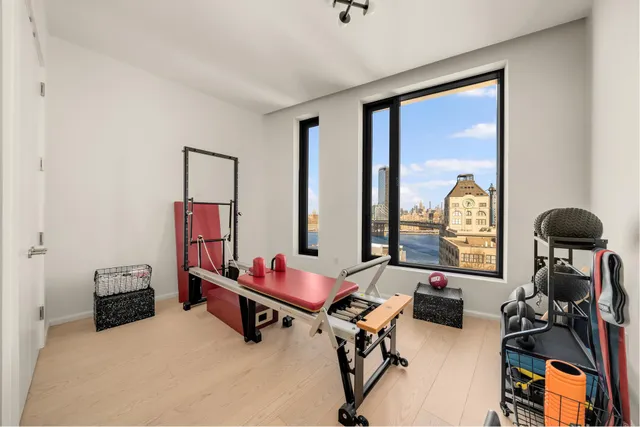 a room with furniture and a large window