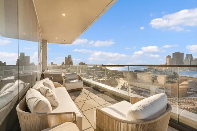 a view of a balcony with lake view and mountain view