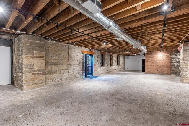 a front view of a house with parking