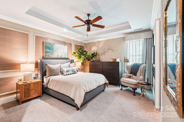 a bedroom with a bed a desk and chair