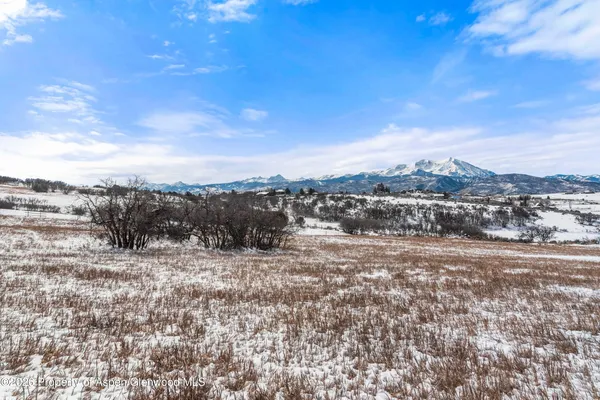 a view of mountain view with lots of trees