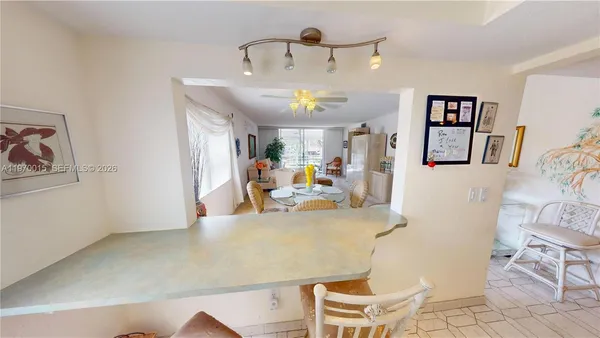 a view of a living room and bathroom