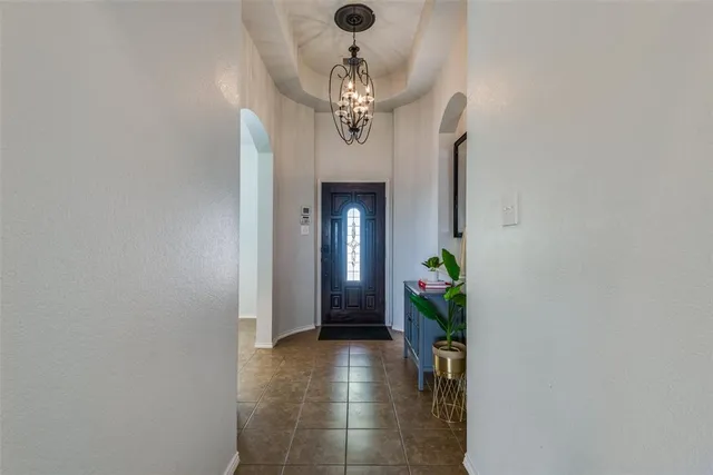 a view of a chandelier in a livingroom