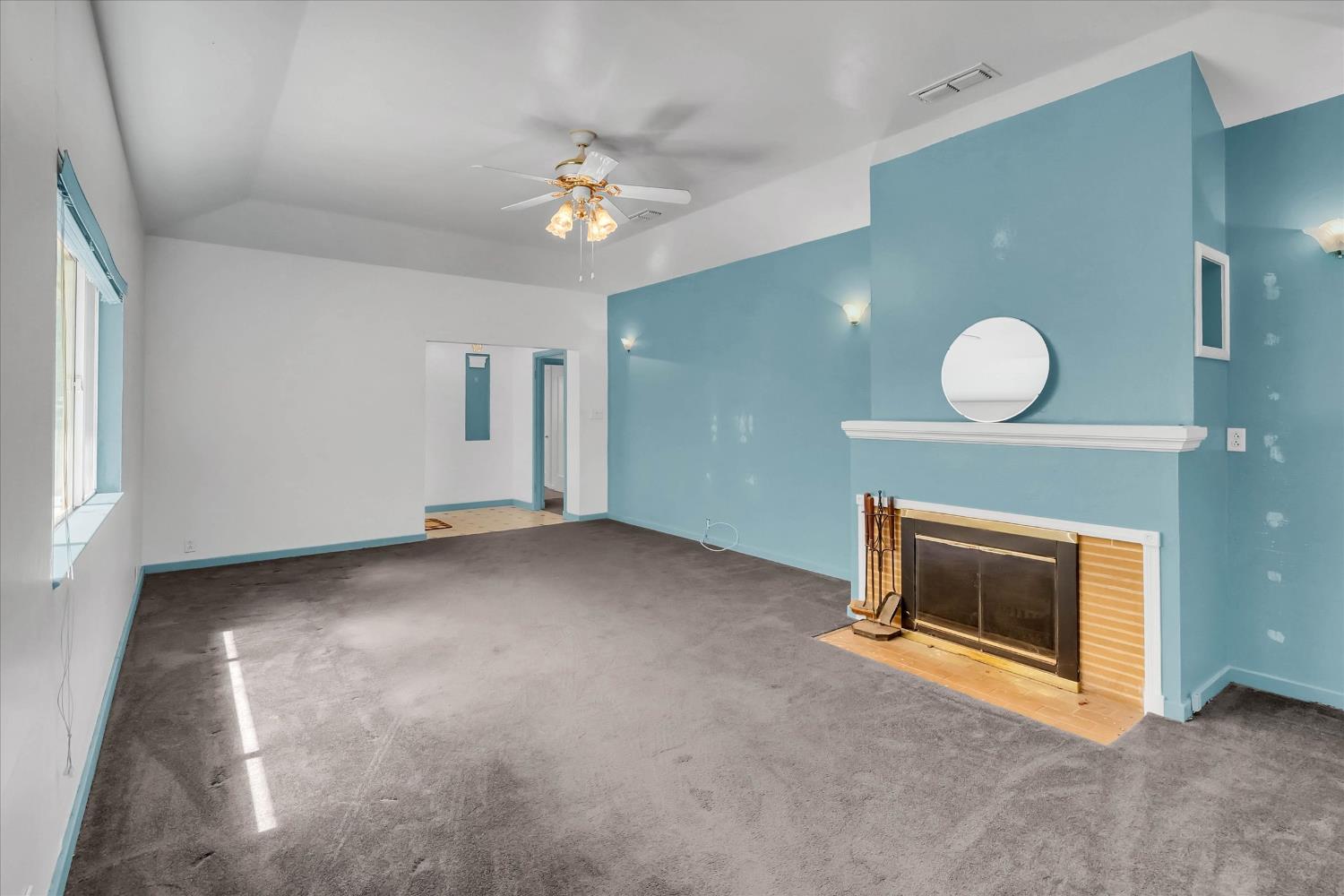 39640 South River Road Clarksburg, CA 95612 - Photo 6 of 25 a view of empty room with a fireplace