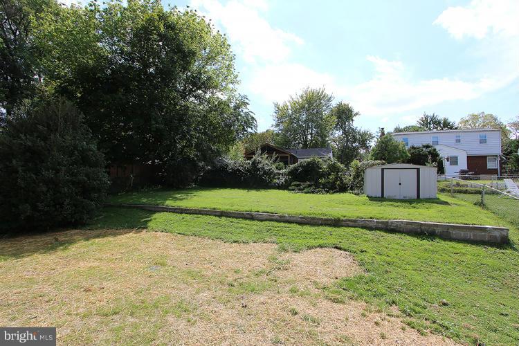 1005 Baltimore Road Rockville, MD 20851 - Photo 25 of 26 Exterior Rear, New Grass Planted and Storage Shed