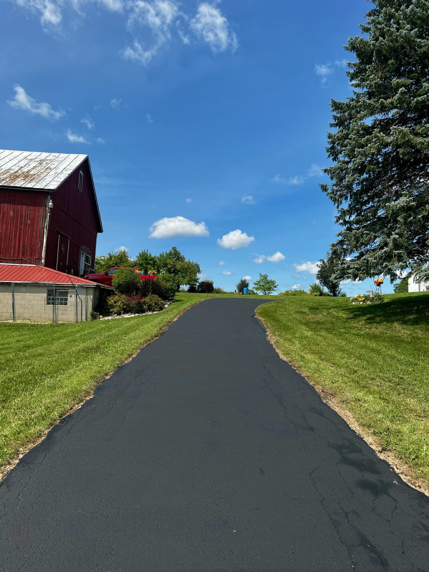 N2640 Bates Road Lyndon, WI 53011 - Photo 24 of 31 Driveway to home