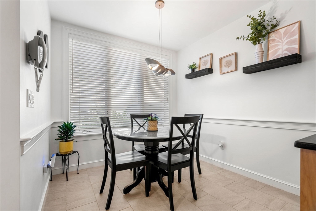 12 Highwood Lane Ipswich, MA 01938 - Photo 14 of 42 a view of a dining room with furniture and window