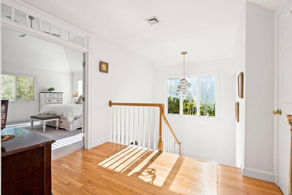 12 Highwood Lane Ipswich, MA 01938 - Photo 20 of 42 a bedroom with a bed and a window