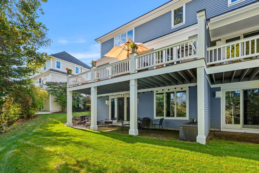 12 Highwood Lane Ipswich, MA 01938 - Photo 2 of 42 front view of a building with a yard