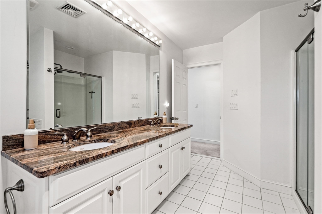 12 Highwood Lane Ipswich, MA 01938 - Photo 23 of 42 a bathroom with a sink and a mirror