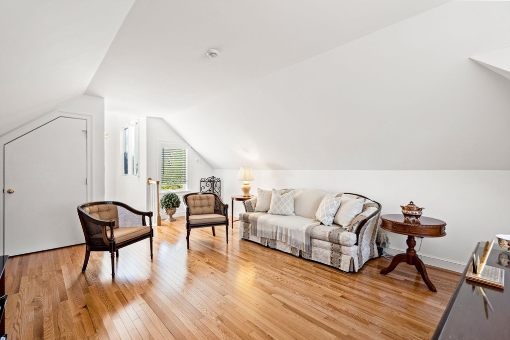 12 Highwood Lane Ipswich, MA 01938 - Photo 25 of 42 a living room with furniture and a wooden floor