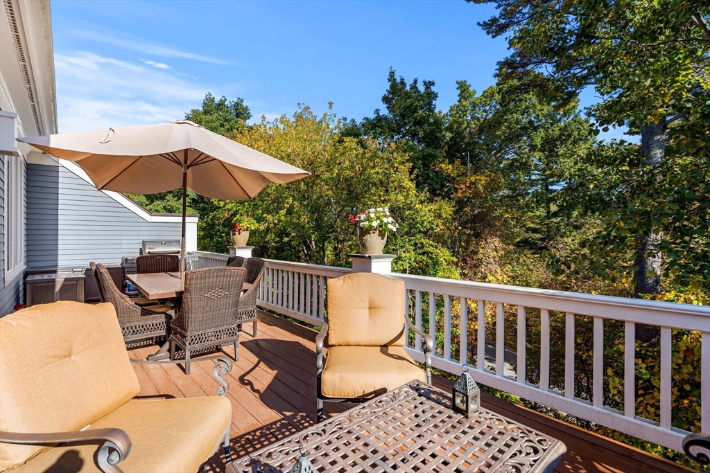12 Highwood Lane Ipswich, MA 01938 - Photo 3 of 42 a view of balcony with wooden floor and outdoor seating