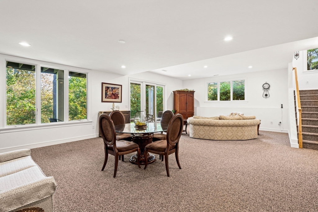 12 Highwood Lane Ipswich, MA 01938 - Photo 32 of 42 a living room with furniture and a large window