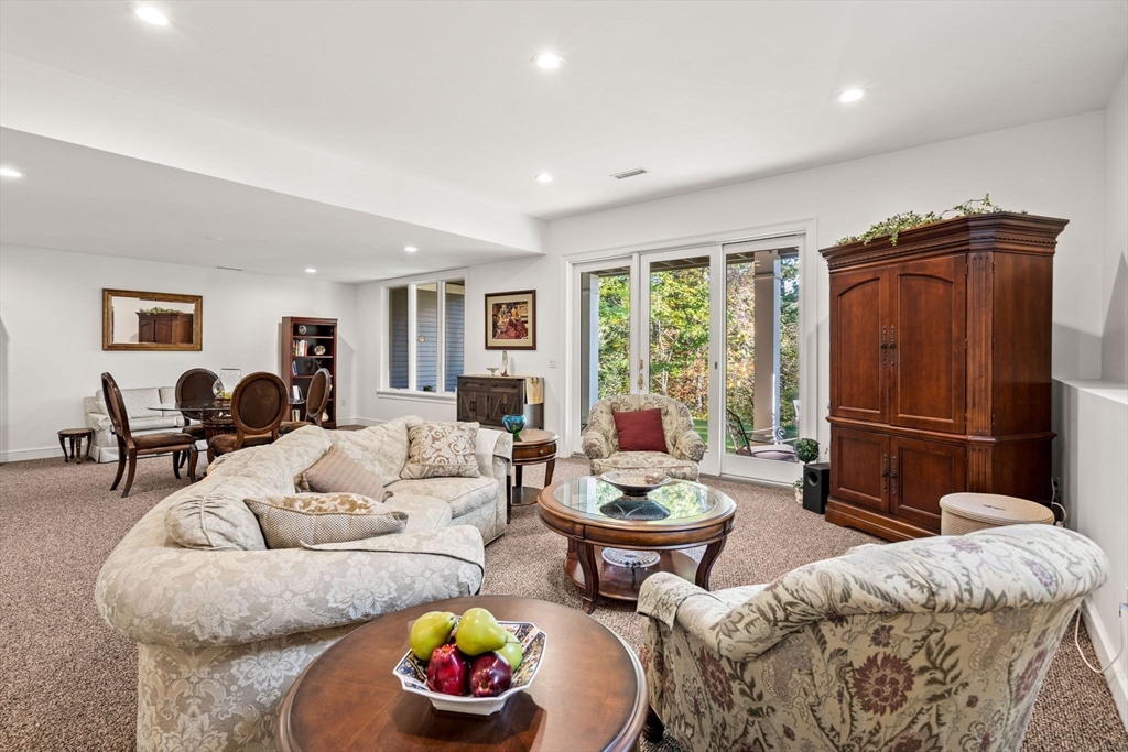 12 Highwood Lane Ipswich, MA 01938 - Photo 33 of 42 a living room with furniture and a window