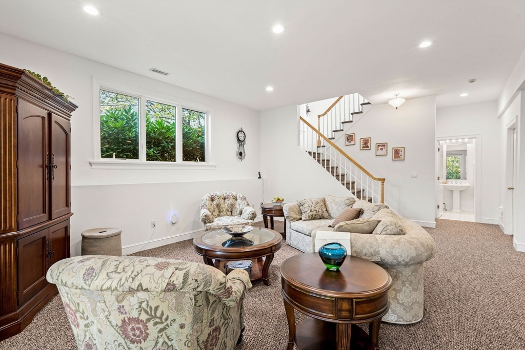 12 Highwood Lane Ipswich, MA 01938 - Photo 34 of 42 a living room with furniture and a table