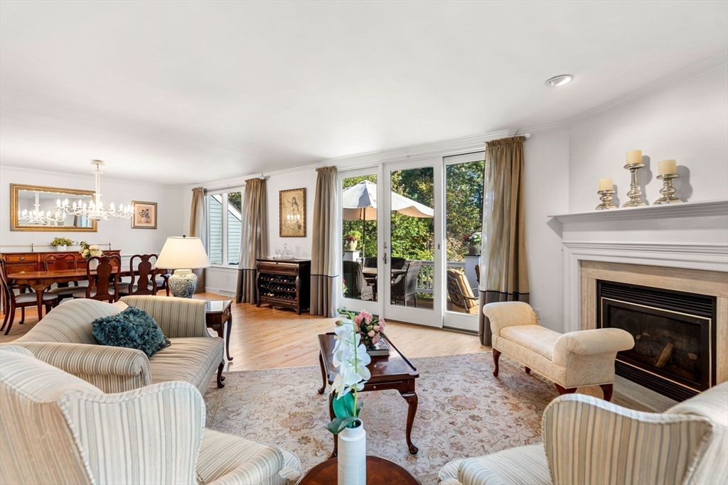 12 Highwood Lane Ipswich, MA 01938 - Photo 7 of 42 a living room with furniture and a fireplace