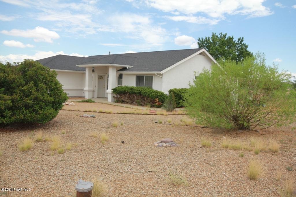 3221 North Reed Road Chino Valley, AZ 86323 - Photo 2 of 24 front view of a house with a yard