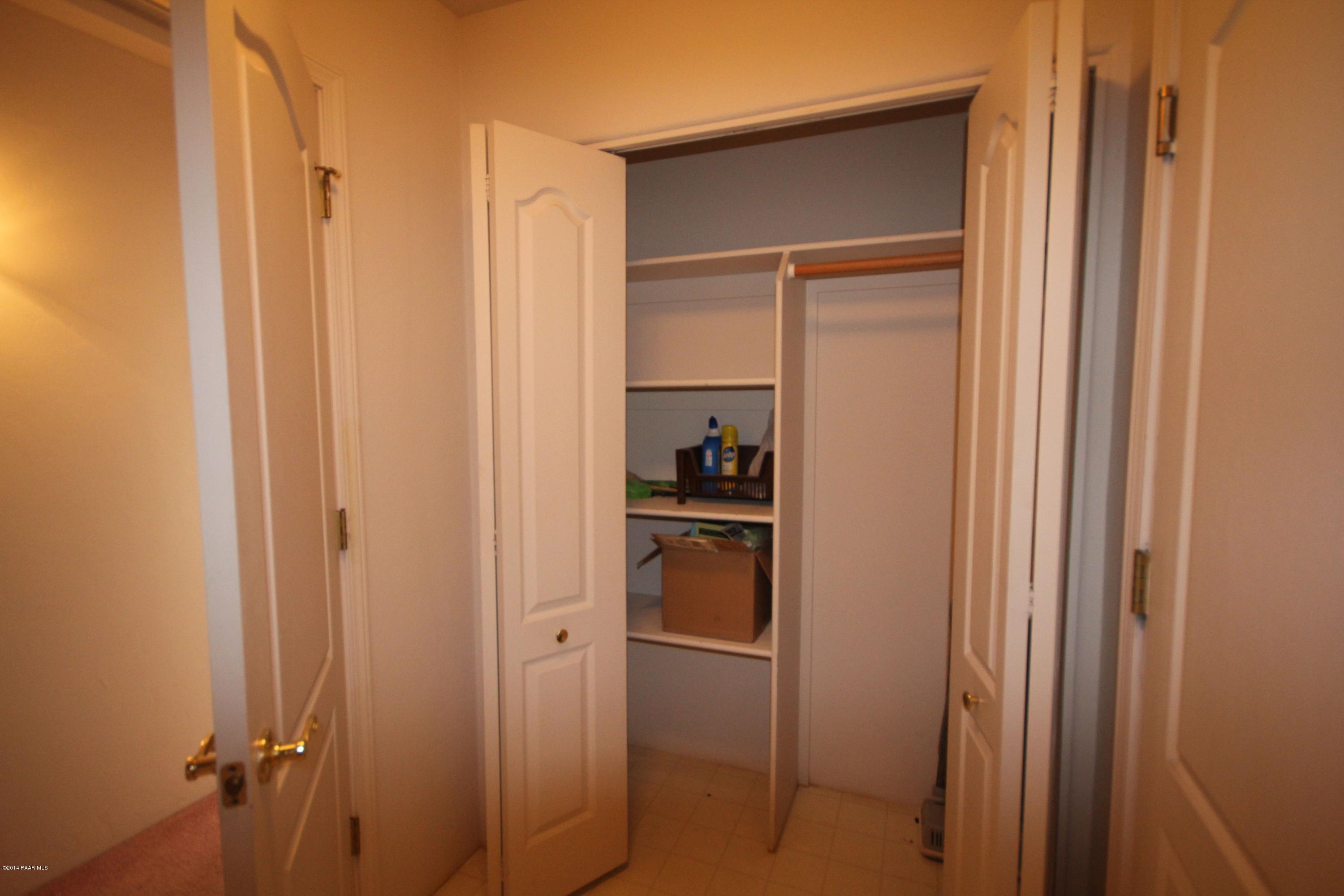 3221 North Reed Road Chino Valley, AZ 86323 - Photo 21 of 24 a refrigerator freezer sitting inside of a kitchen