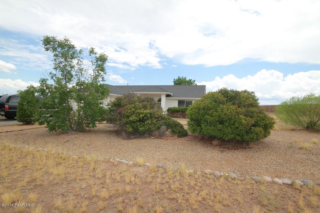 3221 North Reed Road Chino Valley, AZ 86323 - Photo 3 of 24 front view of a house with a yard