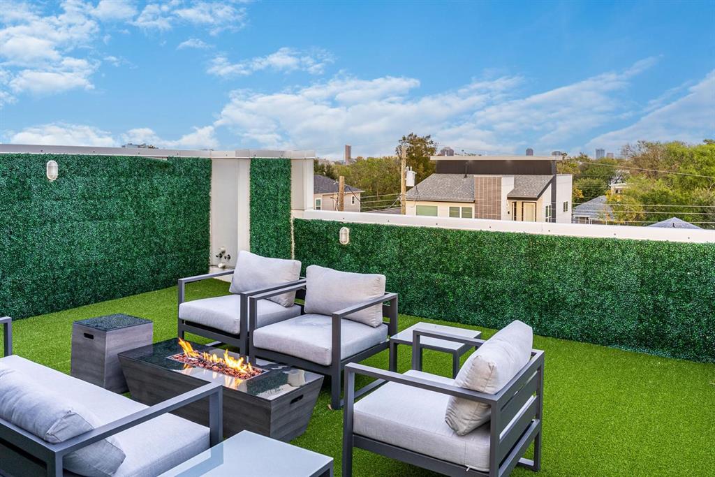 4013 Ivanhoe Lane Dallas, TX 75212 - Photo 32 of 38 View of patio with an outdoor living space with a fire pit