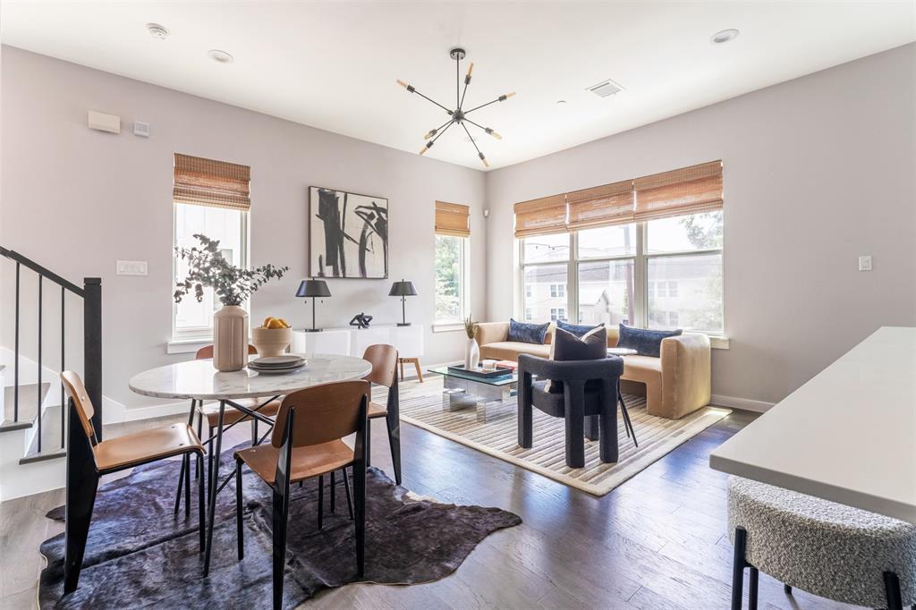 a view of a dining room with furniture window and outside view