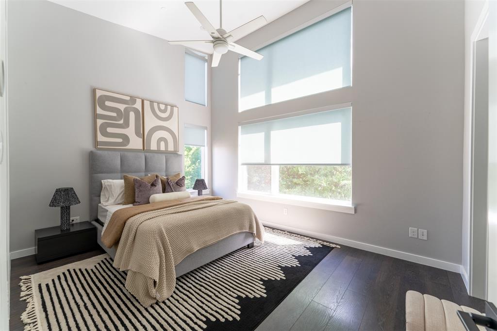 4620 Munger Avenue, Unit 107 Dallas, TX 75204 - Photo 13 of 28 a bedroom with a bed and a window