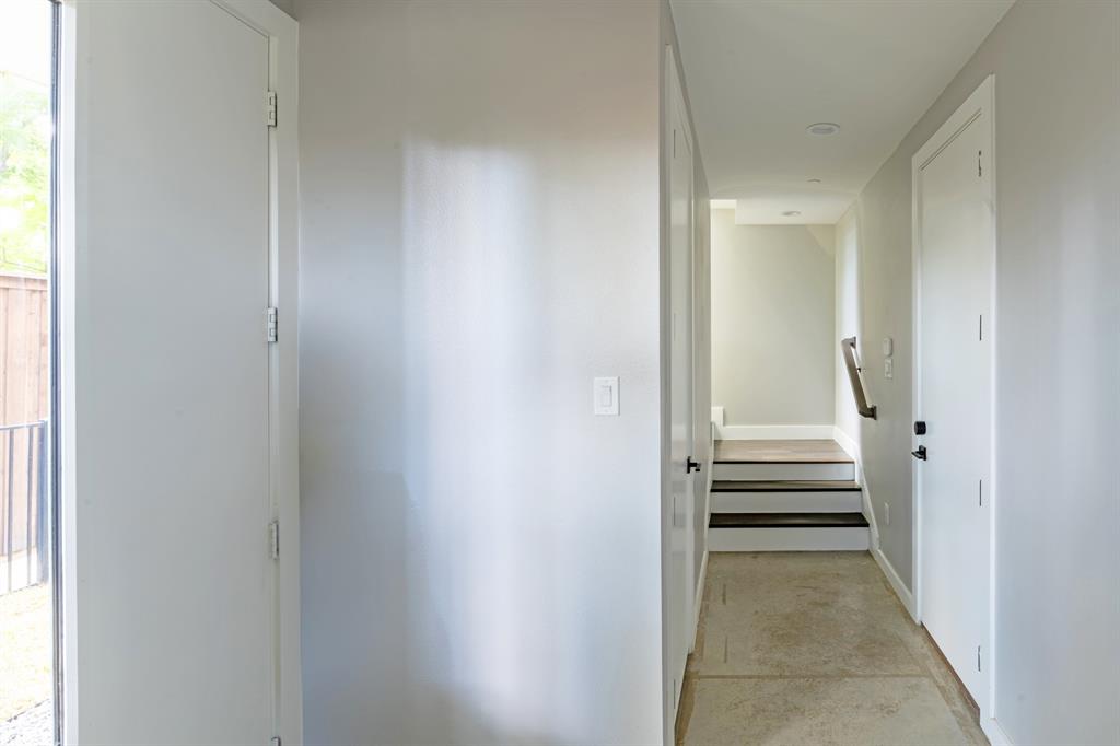 4620 Munger Avenue, Unit 107 Dallas, TX 75204 - Photo 23 of 28 a view of a room with a door