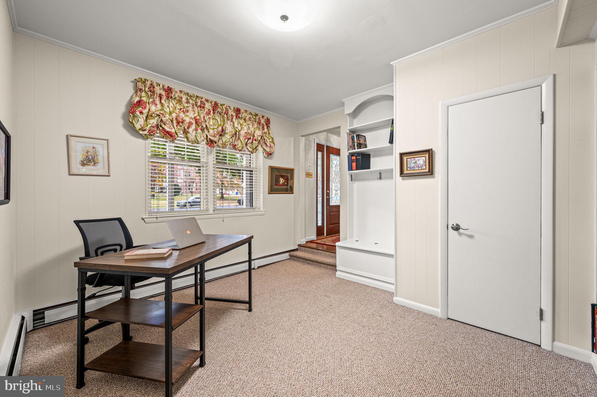 509 Lawrence Drive Springfield, PA 19064 - Photo 19 of 37 a view of a livingroom with furniture and a window