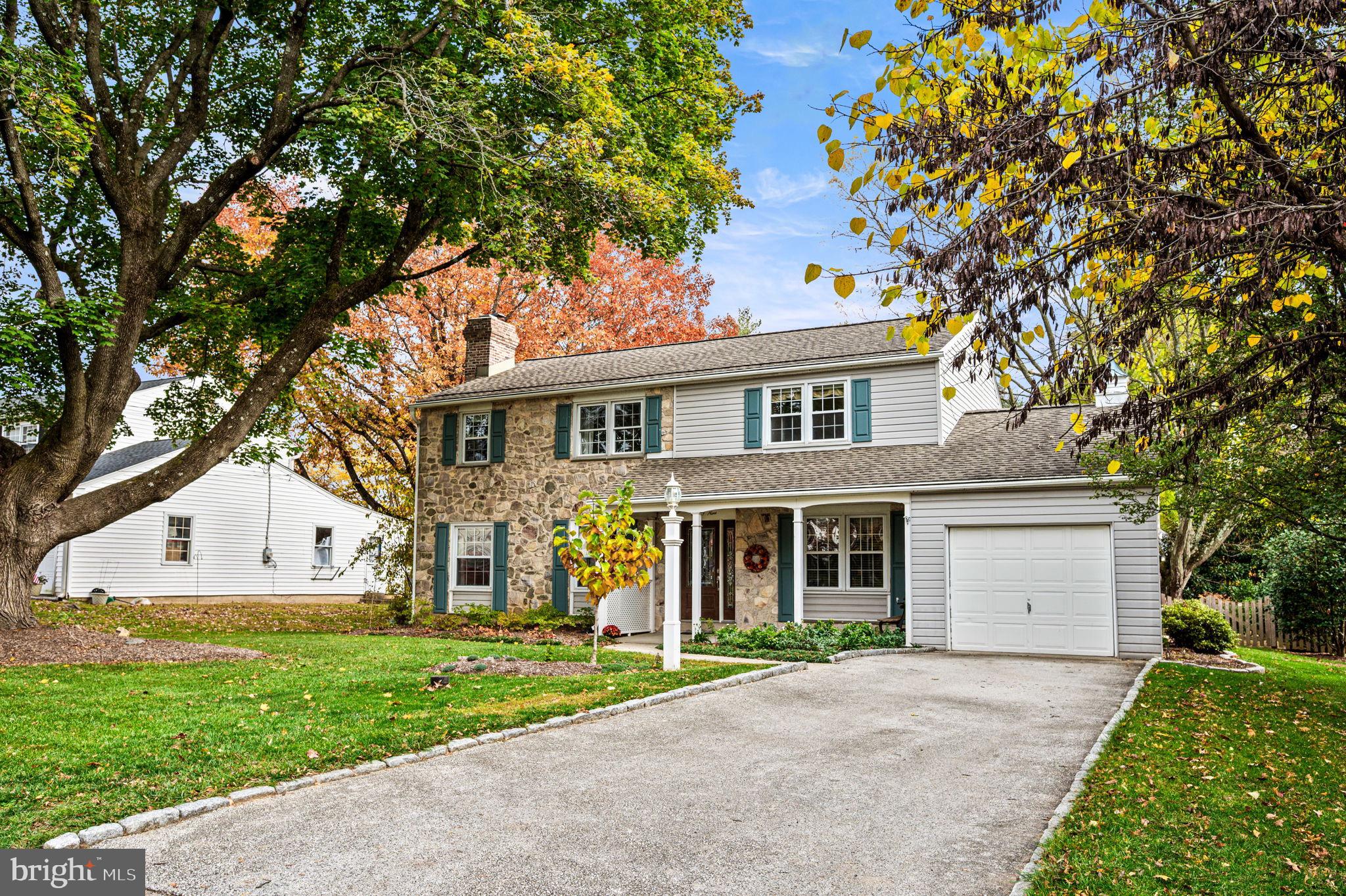 509 Lawrence Drive Springfield, PA 19064 - Photo 2 of 37 front view of a house with a yard
