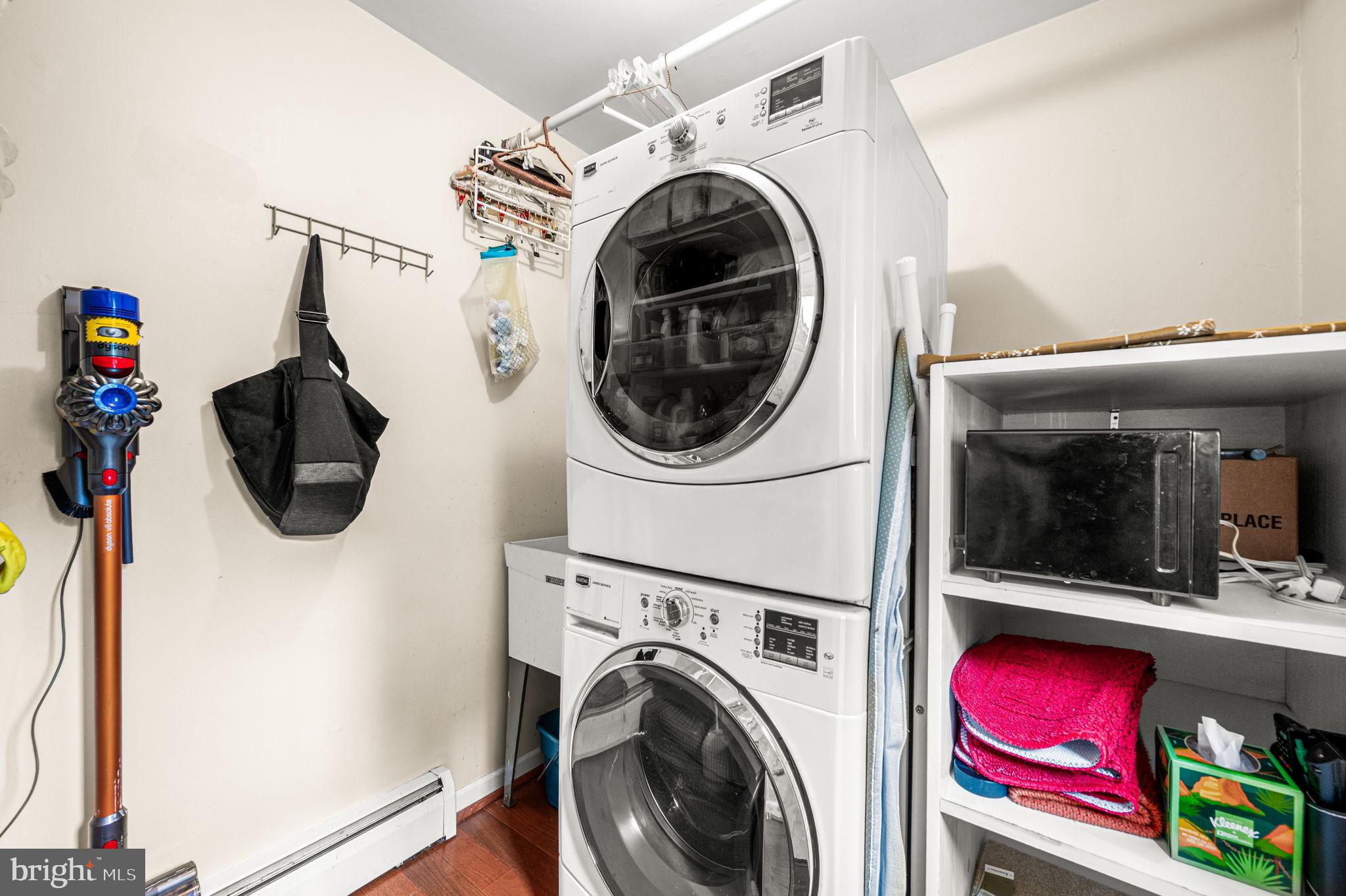 509 Lawrence Drive Springfield, PA 19064 - Photo 21 of 37 a utility room with dryer and washer