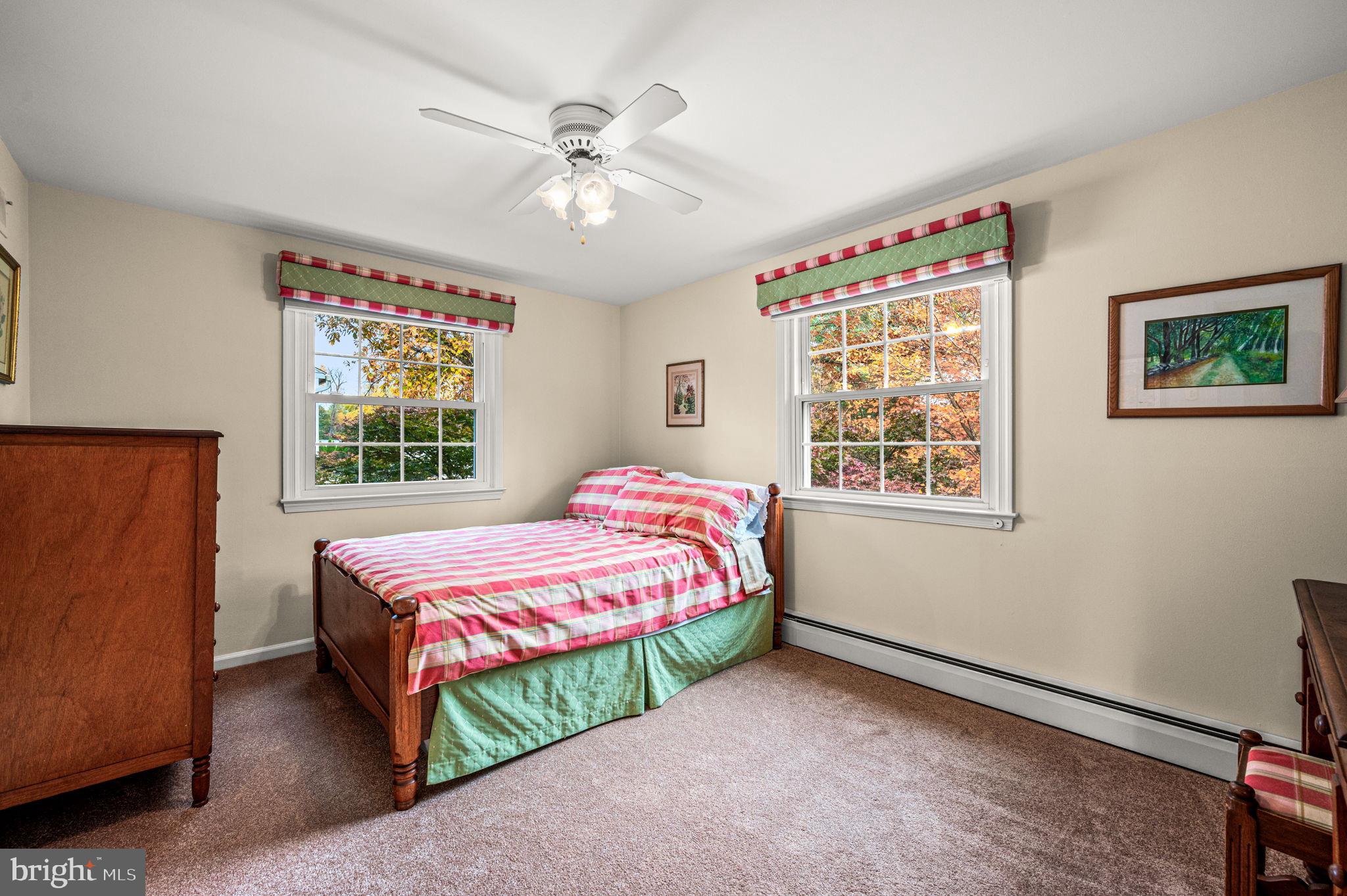 509 Lawrence Drive Springfield, PA 19064 - Photo 26 of 37 a bedroom with a bed and a window
