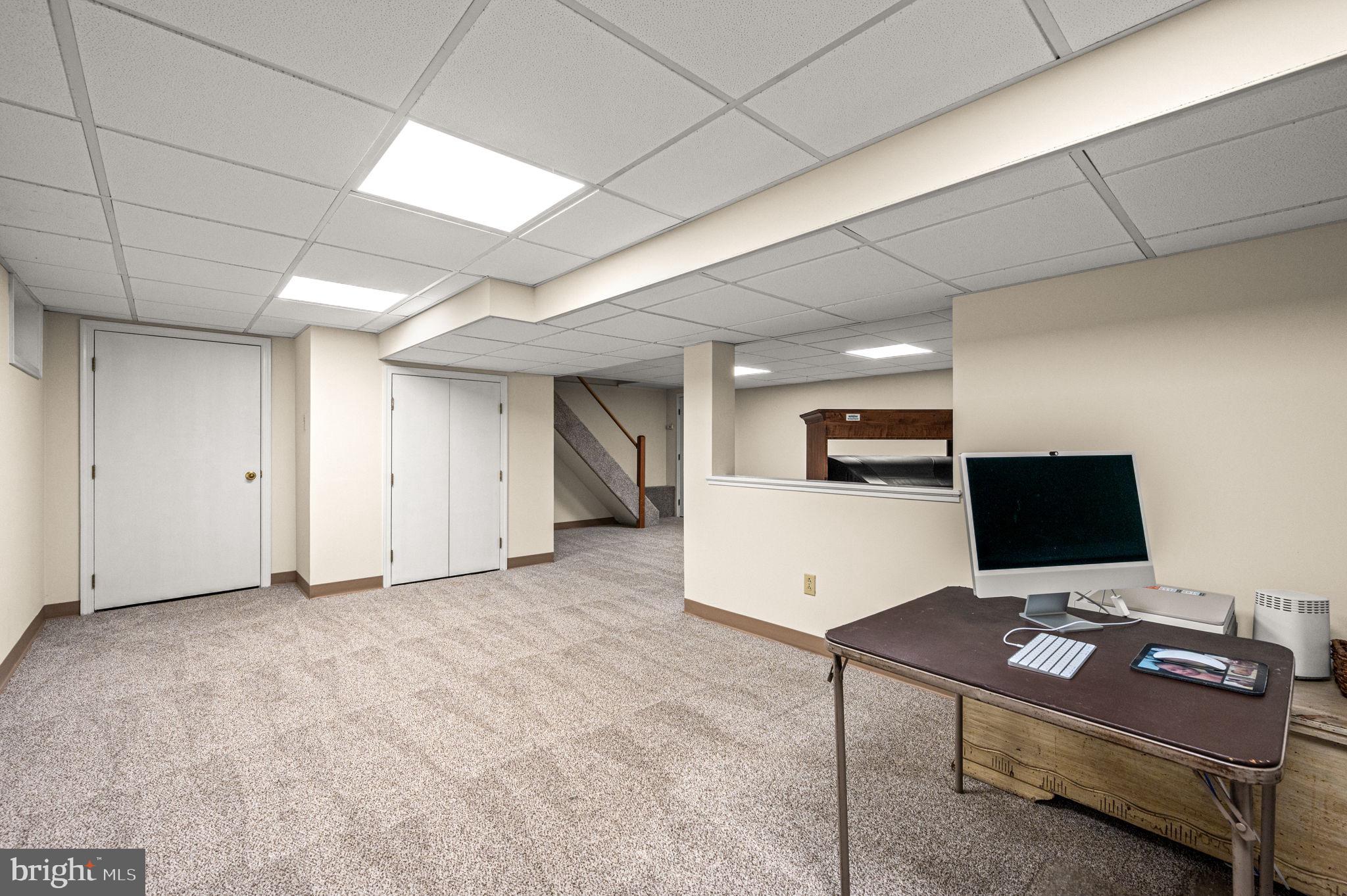 509 Lawrence Drive Springfield, PA 19064 - Photo 31 of 37 a view of workspace with a flat screen tv