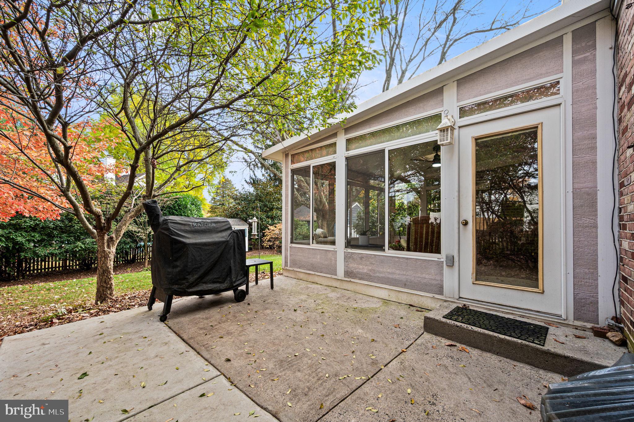 509 Lawrence Drive Springfield, PA 19064 - Photo 35 of 37 a view of house with backyard and outdoor seating